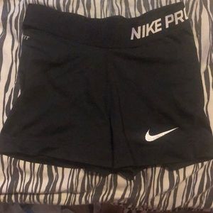 black nike pros size XS